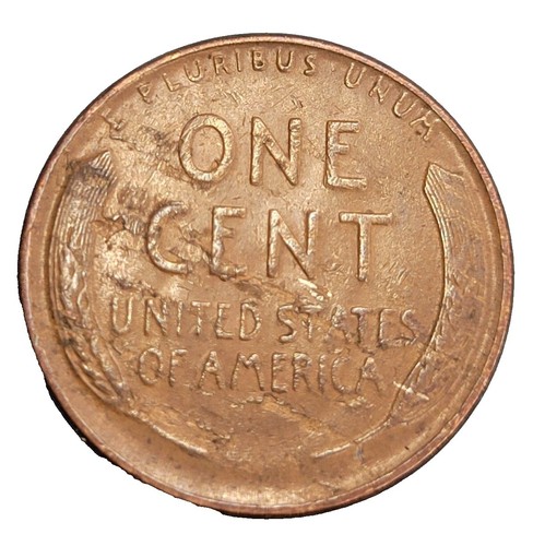 1915 wheat penny off-center strike error showing partial design and unstruck planchet crescent
